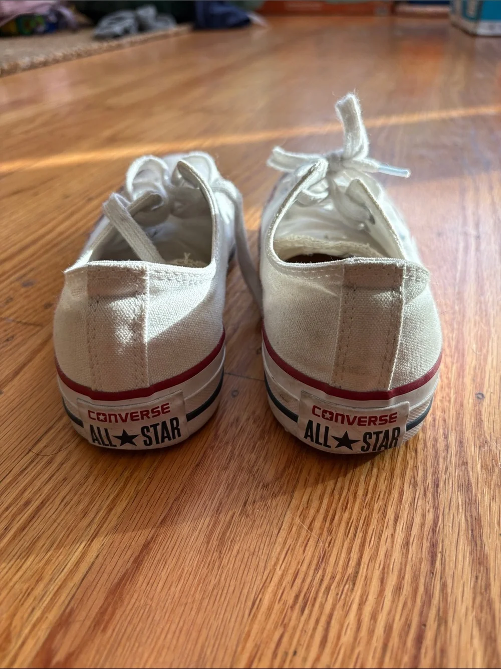 Converse Low Top Sneakers in Off-White with Red Stripe